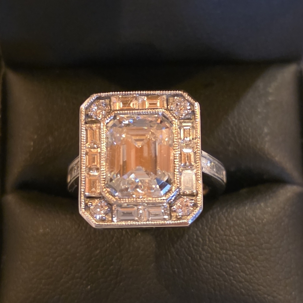Debebians EMERALD HALO ENGAGEMENT RING.